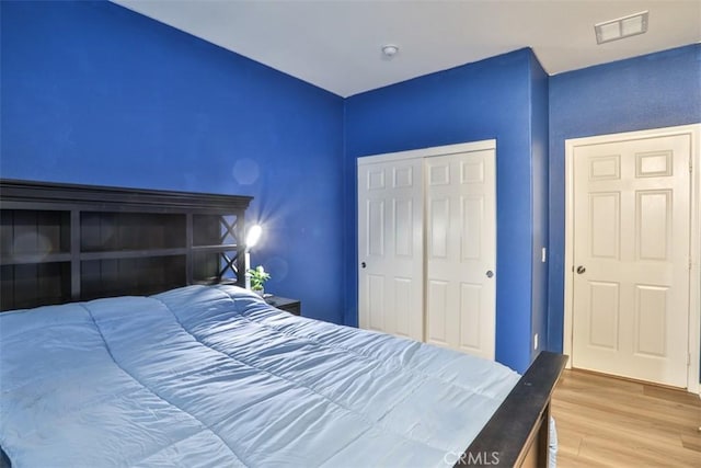 13256 Garcia Ct, Rancho Cucamonga, CA 91739 - bedroom featuring wood finished floors and a closet