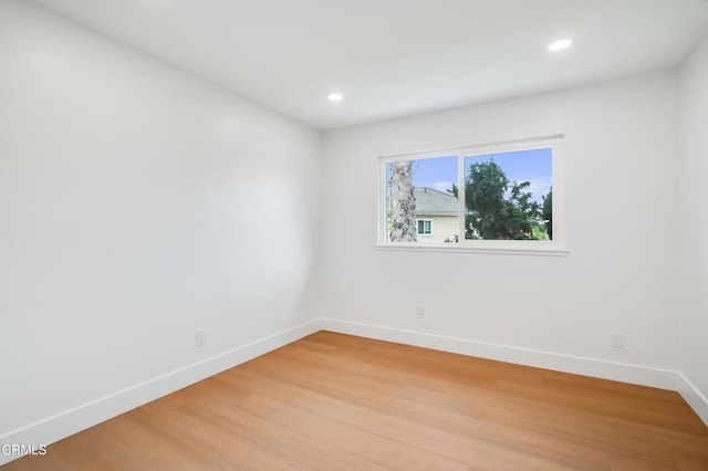 12938 Guadalajara Cir, Cerritos, CA 90703 - spare room with baseboards, light wood-style floors, and recessed lighting