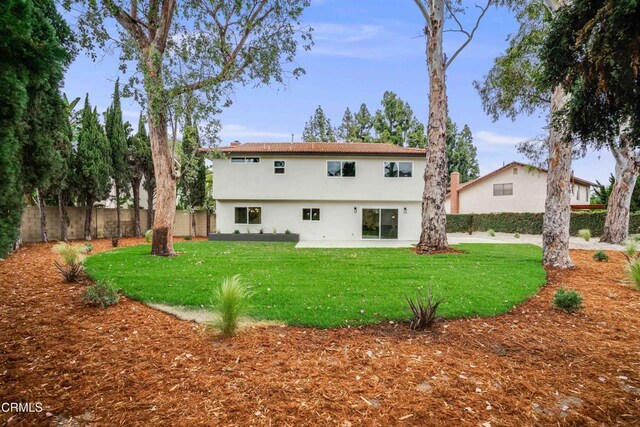 12938 Guadalajara Cir, Cerritos, CA 90703 - back of property with stucco siding