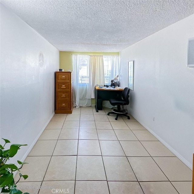 45439 Lorimer Ave, Lancaster, CA 93534 - office space featuring a textured ceiling, light tile patterned flooring, and baseboards