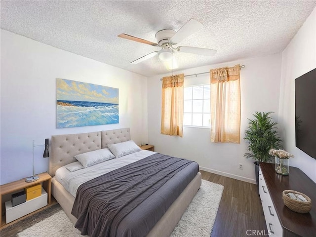 45439 Lorimer Ave, Lancaster, CA 93534 - bedroom featuring wood finished floors, a ceiling fan, baseboards, and a textured ceiling