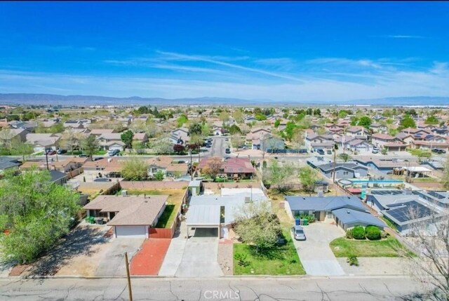 45439 Lorimer Ave, Lancaster, CA 93534 - aerial perspective of suburban area featuring a mountain backdrop
