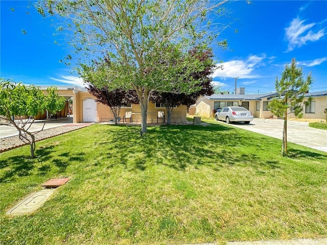 45439 Lorimer Ave, Lancaster, CA 93534 - view of front of property with stucco siding and a front yard