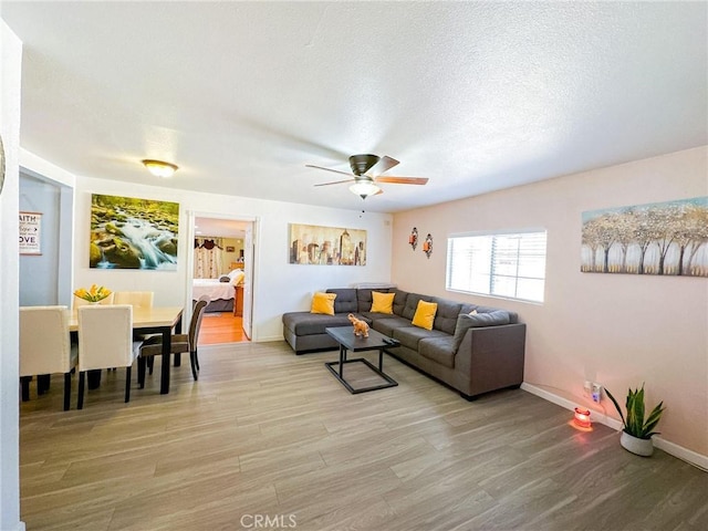 45439 Lorimer Ave, Lancaster, CA 93534 - living room with ceiling fan, light wood-type flooring, and baseboards