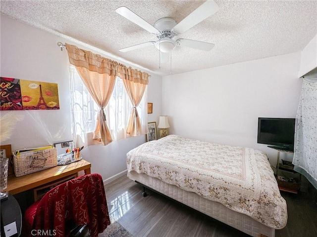 45439 Lorimer Ave, Lancaster, CA 93534 - bedroom with a textured ceiling, wood finished floors, ceiling fan, and baseboards