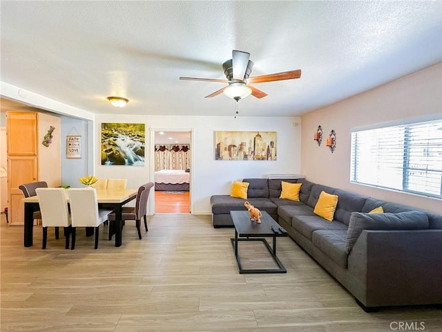 45439 Lorimer Ave, Lancaster, CA 93534 - living room with a ceiling fan and light wood-style floors