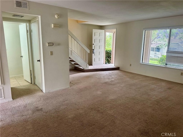 2802 Via Diego, Carlsbad, CA 92010 - unfurnished living room with light carpet and stairway