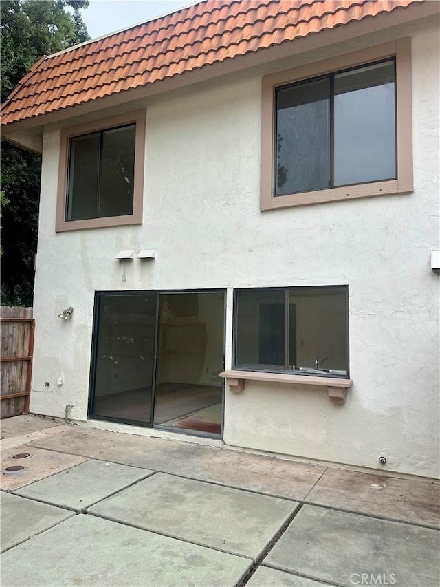2802 Via Diego, Carlsbad, CA 92010 - back of property with stucco siding, a tile roof, and a patio