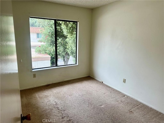 2802 Via Diego, Carlsbad, CA 92010 - carpeted spare room featuring baseboards