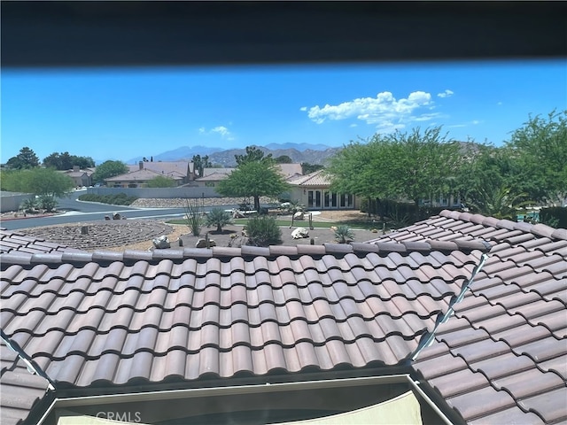 7448 Del Rio Vis, Yucca Valley, CA 92284 - detailed view of a tiled roof and mountains
