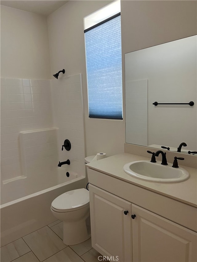 7448 Del Rio Vis, Yucca Valley, CA 92284 - bathroom featuring vanity, toilet, shower / bath combination, and tile patterned floors