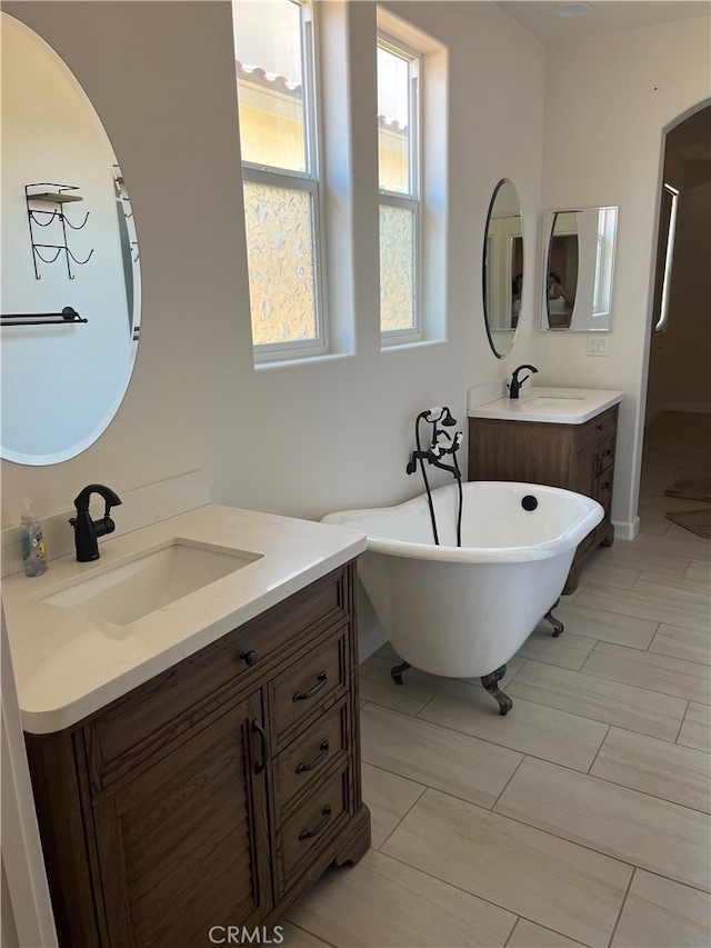 7448 Del Rio Vis, Yucca Valley, CA 92284 - full bathroom with vanity, a freestanding tub, and a shower