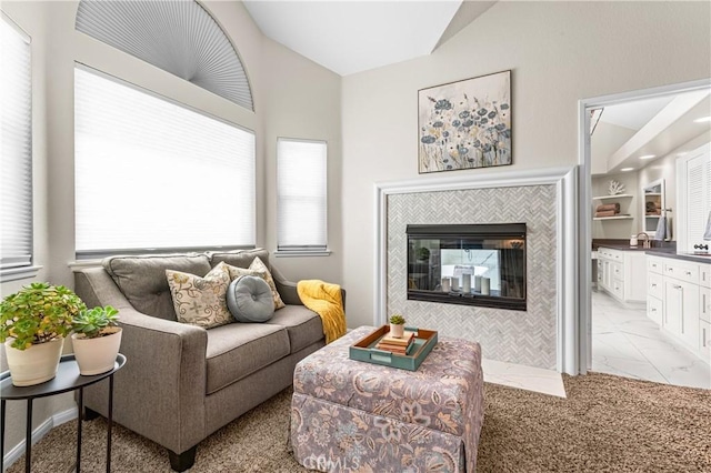 2074 Redgrove Way, Upland, CA 91784 - living area featuring lofted ceiling, light marble finish flooring, and a tiled fireplace