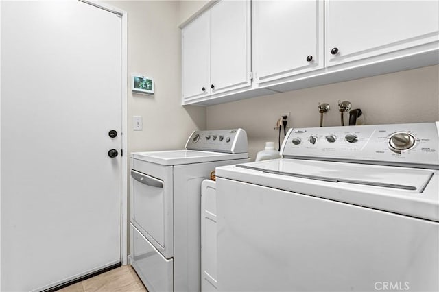 2074 Redgrove Way, Upland, CA 91784 - laundry area featuring washer and clothes dryer and cabinet space