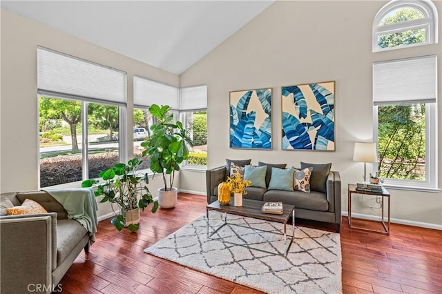 2074 Redgrove Way, Upland, CA 91784 - living room with high vaulted ceiling and hardwood / wood-style flooring