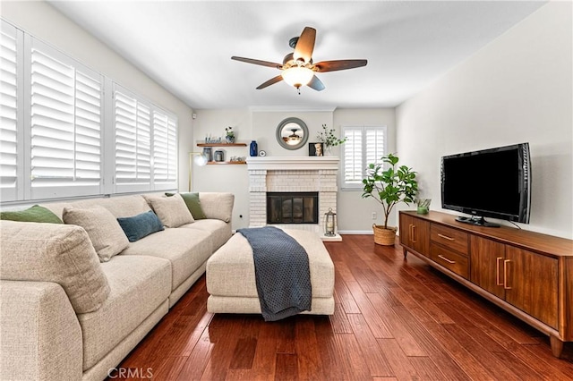 2074 Redgrove Way, Upland, CA 91784 - living area featuring a ceiling fan, dark wood-style floors, and a brick fireplace