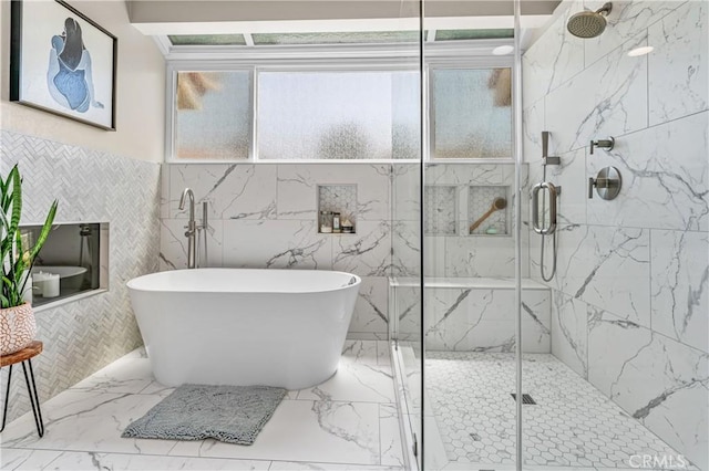 2074 Redgrove Way, Upland, CA 91784 - bathroom with a freestanding bath, a marble finish shower, marble tiled floors, and tile walls