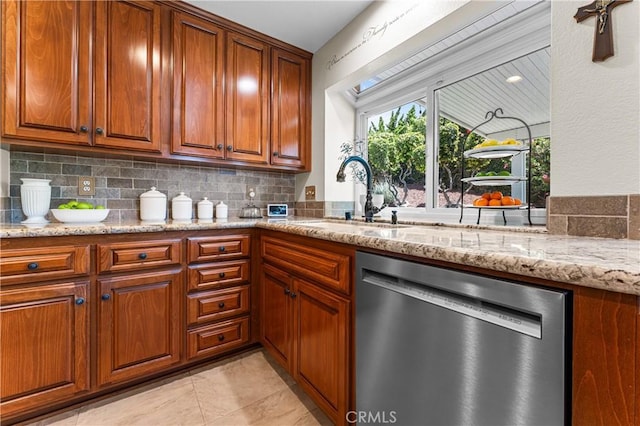 2074 Redgrove Way, Upland, CA 91784 - kitchen featuring dishwasher, tasteful backsplash, light stone counters, brown cabinets, and light tile patterned floors