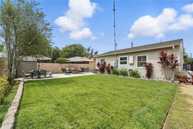 3848 Ocana Ave, Long Beach, CA 90808 - rear view of house with stucco siding and a patio