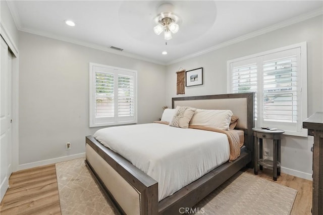 3848 Ocana Ave, Long Beach, CA 90808 - bedroom featuring light wood-style flooring, crown molding, recessed lighting, a closet, and ceiling fan