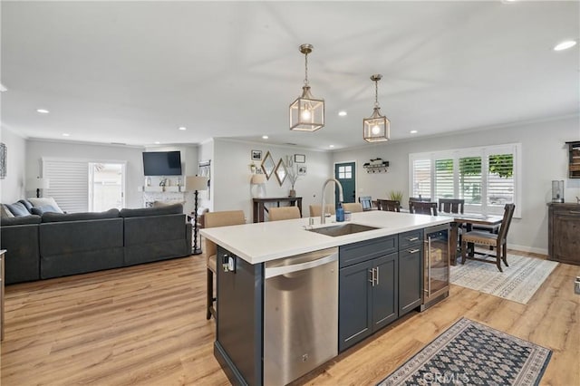 3848 Ocana Ave, Long Beach, CA 90808 - kitchen with dishwasher, wine cooler, open floor plan, light countertops, and decorative light fixtures