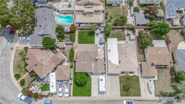 3848 Ocana Ave, Long Beach, CA 90808 - aerial view of property and surrounding area featuring a pool and nearby suburban area