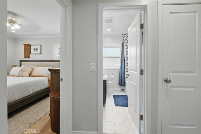 3848 Ocana Ave, Long Beach, CA 90808 - bedroom with crown molding and connected bathroom