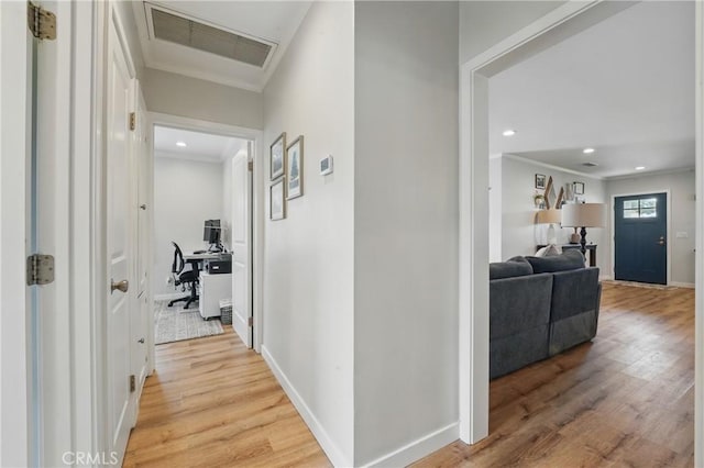 3848 Ocana Ave, Long Beach, CA 90808 - corridor featuring a desk, light wood-style floors, ornamental molding, and recessed lighting