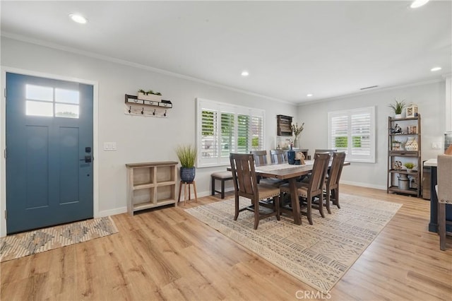 3848 Ocana Ave, Long Beach, CA 90808 - dining area with recessed lighting, light wood-style floors, and ornamental molding