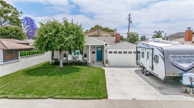 3848 Ocana Ave, Long Beach, CA 90808 - view of property hidden behind natural elements featuring a front lawn, driveway, a garage, and covered porch