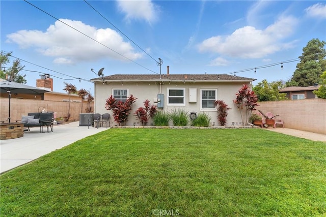 3848 Ocana Ave, Long Beach, CA 90808 - rear view of house with a patio, stucco siding, and outdoor lounge area