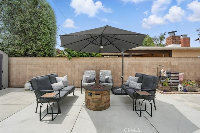 3848 Ocana Ave, Long Beach, CA 90808 - view of patio with an outdoor living space with a fire pit