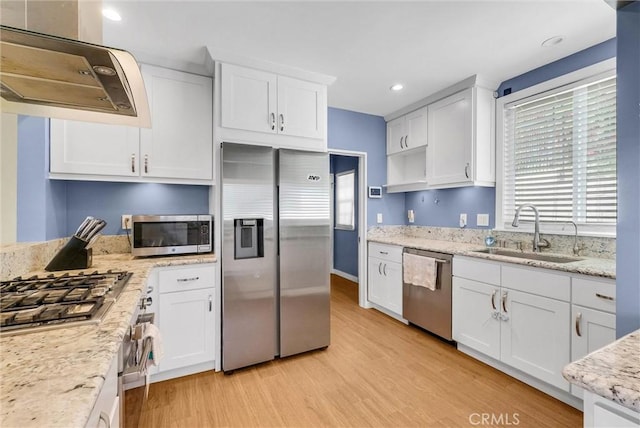 918 Dorothea Rd, La Habra Heights, CA 90631 - kitchen featuring a sink, appliances with stainless steel finishes, exhaust hood, light wood-style flooring, and recessed lighting