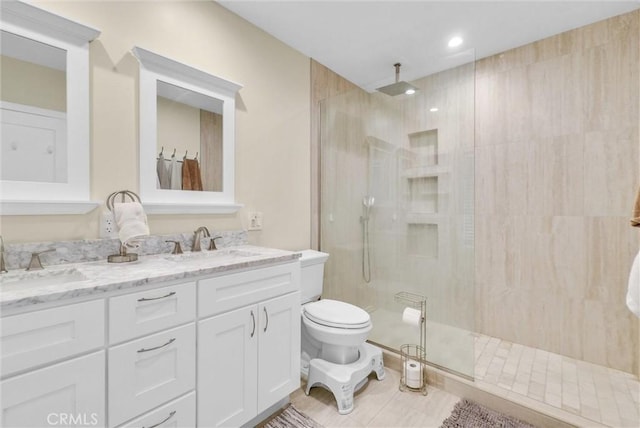 918 Dorothea Rd, La Habra Heights, CA 90631 - bathroom featuring a walk in shower, double vanity, toilet, and tile patterned floors
