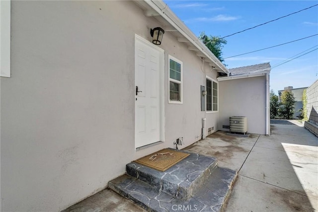 918 Dorothea Rd, La Habra Heights, CA 90631 - entrance to property featuring stucco siding, a patio area, and cooling unit