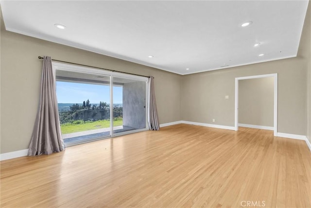 918 Dorothea Rd, La Habra Heights, CA 90631 - unfurnished room with baseboards, light wood finished floors, and recessed lighting