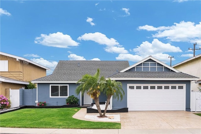 1440 E Abila St, Carson, CA 90745 - view of front of property featuring a shingled roof, a garage, driveway, and stucco siding