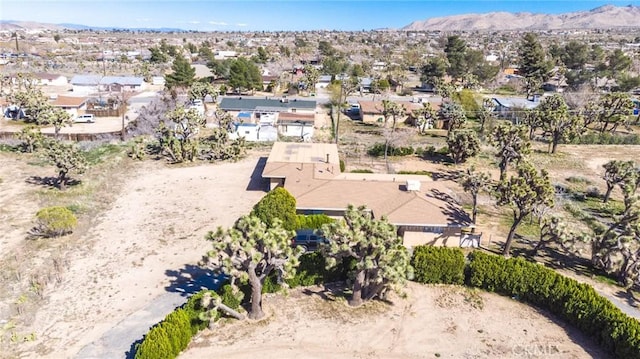 7411 Joshua Ln, Yucca Valley, CA 92284 - aerial overview of property's location with mountains and nearby suburban area