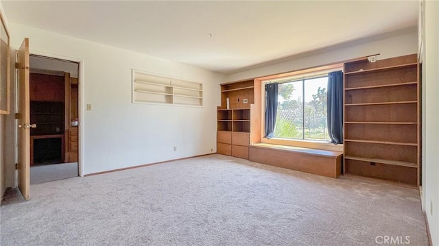 7411 Joshua Ln, Yucca Valley, CA 92284 - carpeted empty room featuring baseboards
