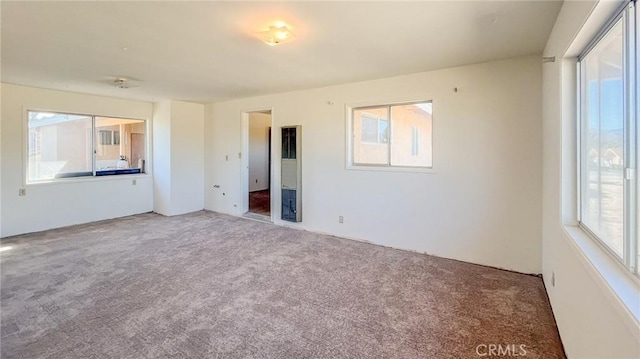 7411 Joshua Ln, Yucca Valley, CA 92284 - carpeted spare room featuring plenty of natural light