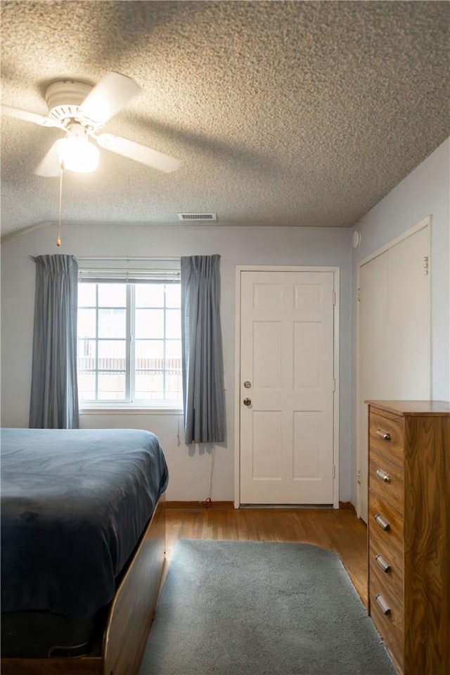 13372 Newhope St, Garden Grove, CA 92843 - bedroom with wood finished floors, a textured ceiling, and ceiling fan
