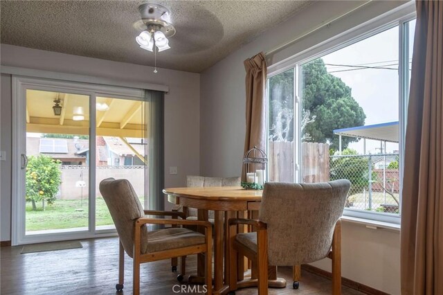 13372 Newhope St, Garden Grove, CA 92843 - dining room featuring a textured ceiling, a ceiling fan, baseboards, and wood finished floors