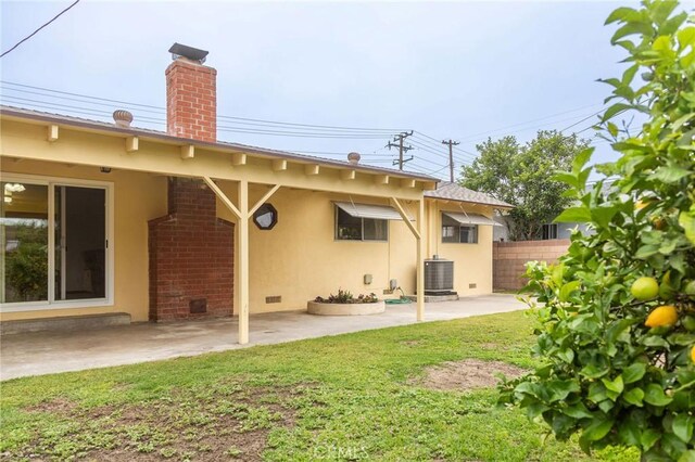 13372 Newhope St, Garden Grove, CA 92843 - rear view of house with crawl space, a patio area, a chimney, and stucco siding