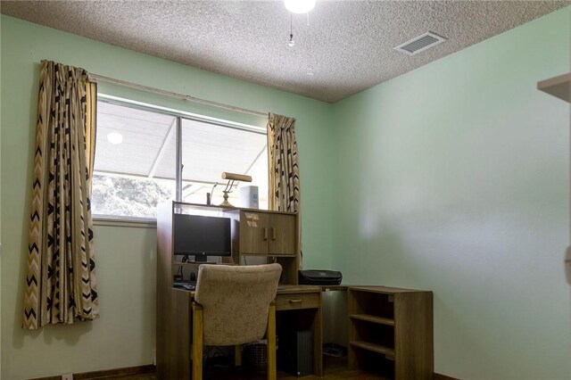 13372 Newhope St, Garden Grove, CA 92843 - office area with a textured ceiling and baseboards