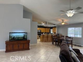 14665 Echo Ln, Helendale, CA 92342 - living area with light tile patterned floors and ceiling fan