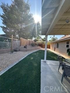 14665 Echo Ln, Helendale, CA 92342 - fenced backyard featuring a patio