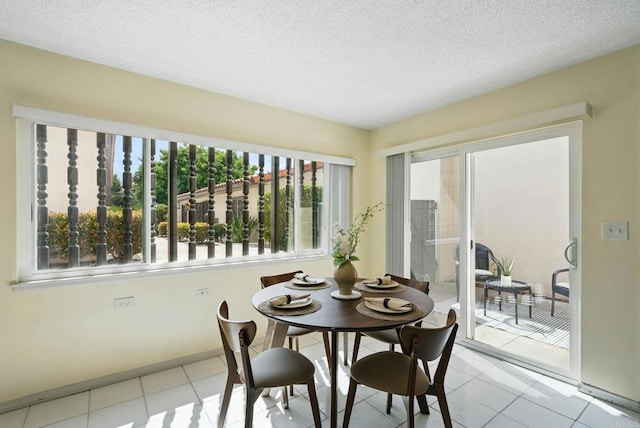 12234 Rancho Bernardo Rd Unit A, Rancho Bernardo San Diego, CA 92128 - dining area with a textured ceiling