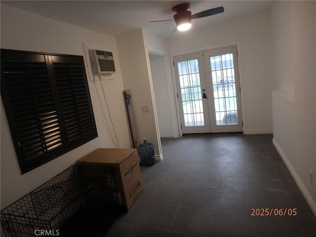 17457 Covello St, Van Nuys, CA 91406 - entryway featuring french doors, ceiling fan, baseboards, dark tile patterned floors, and an AC wall unit