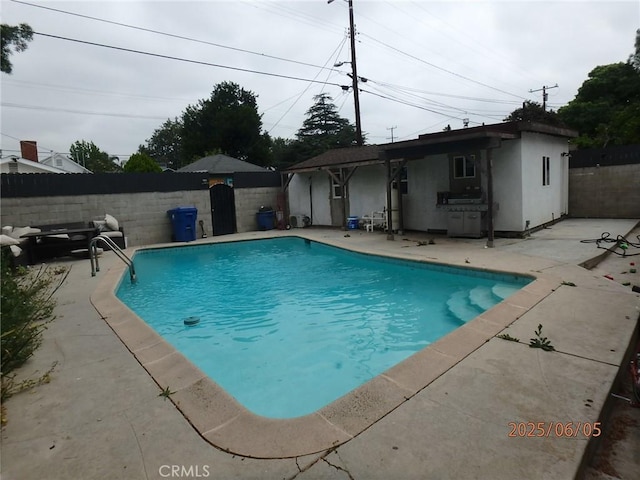17457 Covello St, Van Nuys, CA 91406 - view of pool featuring a patio and a fenced backyard