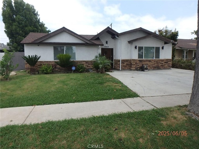 17457 Covello St, Van Nuys, CA 91406 - single story home featuring stucco siding, a front lawn, and stone siding
